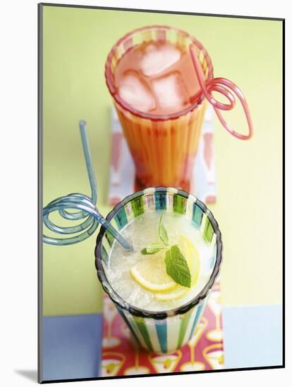 Ice-Cold Lemonade and Pink Grapefruit Juice in Glasses-null-Mounted Photographic Print