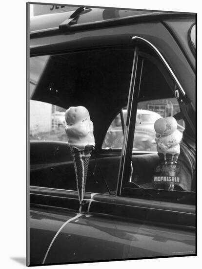 Ice Cream Cone Melting Outside Rolled Up Window of Air Conditioned Car-John Dominis-Mounted Photographic Print