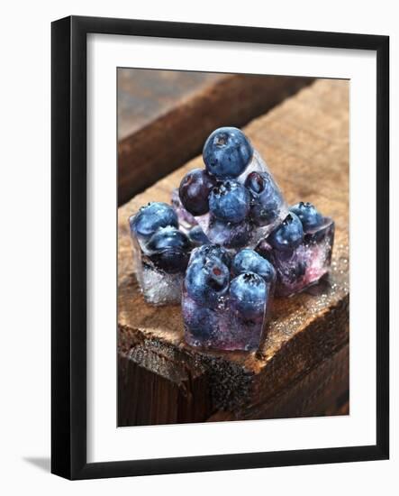 Ice Cubes with Blueberries on a Wooden Table-Chris Schäfer-Framed Photographic Print