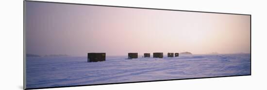 Ice Fishing Shacks on a Frozen Lake, Lake of the Woods, Minnesota, USA-null-Mounted Photographic Print