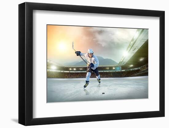 Ice Hockey Player on the Ice. Open Stadium - Winter Classic Game.-Andrey Yurlov-Framed Photographic Print