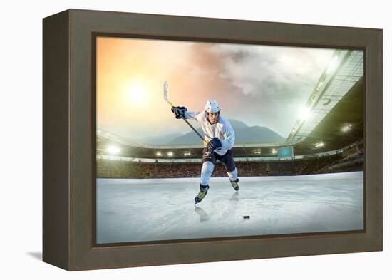 Ice Hockey Player on the Ice. Open Stadium - Winter Classic Game.-Andrey Yurlov-Framed Premier Image Canvas