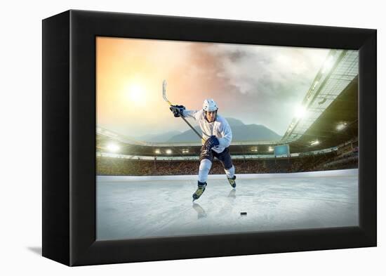 Ice Hockey Player on the Ice. Open Stadium - Winter Classic Game.-Andrey Yurlov-Framed Premier Image Canvas