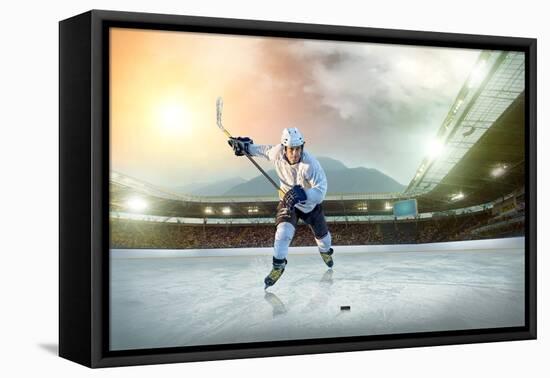 Ice Hockey Player on the Ice. Open Stadium - Winter Classic Game.-Andrey Yurlov-Framed Premier Image Canvas