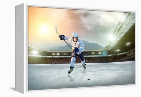 Ice Hockey Player on the Ice. Open Stadium - Winter Classic Game.-Andrey Yurlov-Framed Premier Image Canvas