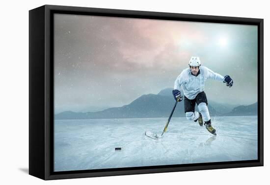 Ice Hockey Player on the Ice, Outdoor.-Andrey Yurlov-Framed Premier Image Canvas