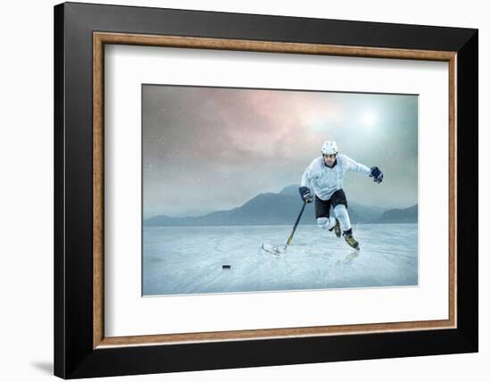 Ice Hockey Player on the Ice, Outdoor.-Andrey Yurlov-Framed Photographic Print