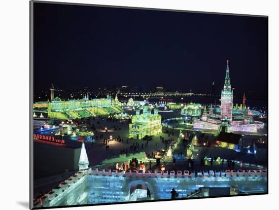 Ice Sculptures Lit at Night, Ice Lantern Festival, Bingdeng Jie, Harbin City, Heilongjiang, China-Tony Waltham-Mounted Photographic Print