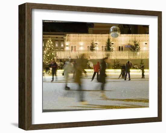 Ice Skating at Night on Ice Rink at Mozartplatz Square, Salzburg, Austria, Europe-Richard Nebesky-Framed Photographic Print