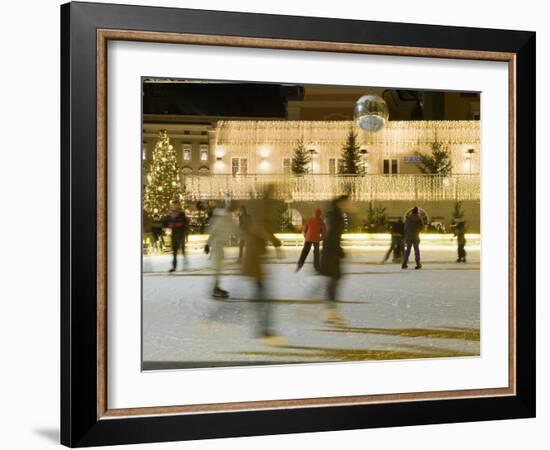 Ice Skating at Night on Ice Rink at Mozartplatz Square, Salzburg, Austria, Europe-Richard Nebesky-Framed Photographic Print