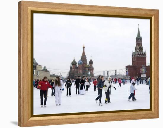 Ice Skating in Red Square, UNESCO World Heritage Site, Moscow, Russia, Europe-Lawrence Graham-Framed Premier Image Canvas