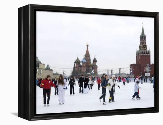 Ice Skating in Red Square, UNESCO World Heritage Site, Moscow, Russia, Europe-Lawrence Graham-Framed Premier Image Canvas