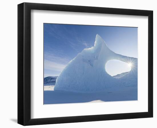 Iceberg frozen into the sea ice of the Uummannaq fjord system during winter. Greenland-Martin Zwick-Framed Photographic Print