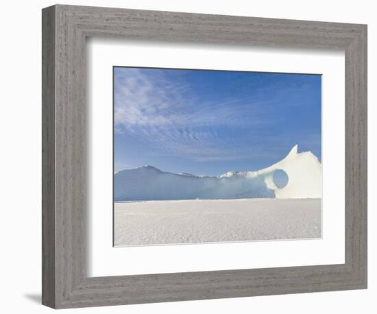 Iceberg frozen into the sea ice of the Uummannaq fjord system during winter. Greenland-Martin Zwick-Framed Photographic Print