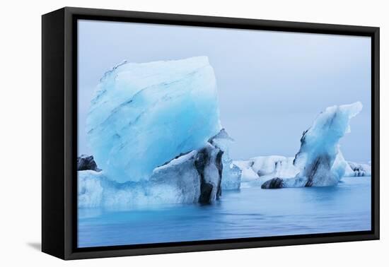 Icebergs floating on Jokulsarlon Glacial Lagoon, Iceland, Polar Regions-Miles Ertman-Framed Premier Image Canvas