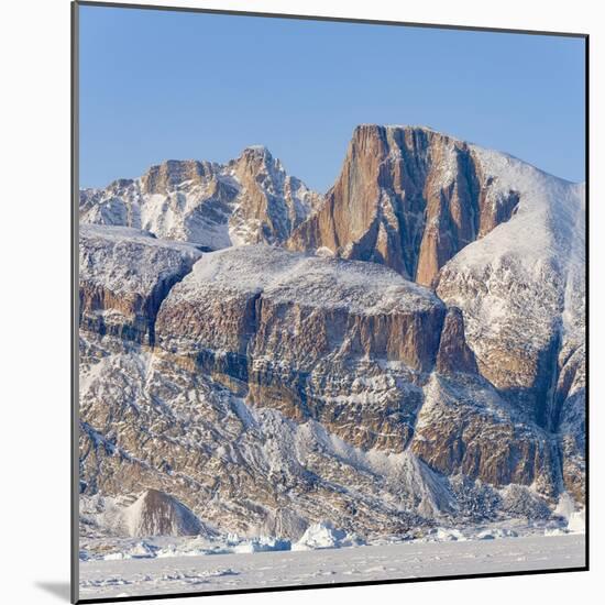 Icebergs in front of Appat Island, frozen into the sea ice of the Uummannaq fjord. Greenland-Martin Zwick-Mounted Photographic Print