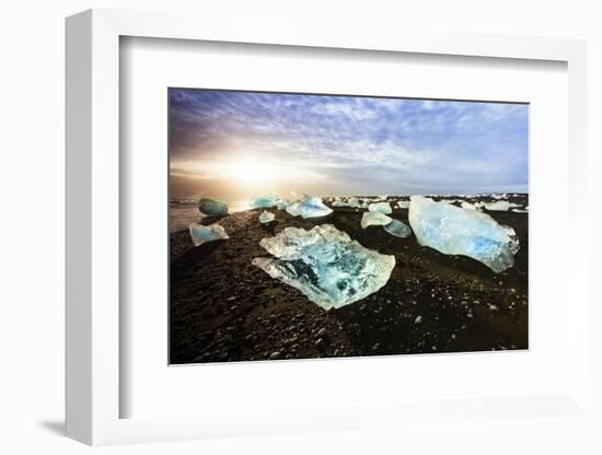 Icebergs on a black sand volcanic beach next to the Jokulsarlon glacial lake in Vatnajokull Nationa-Alex Robinson-Framed Photographic Print