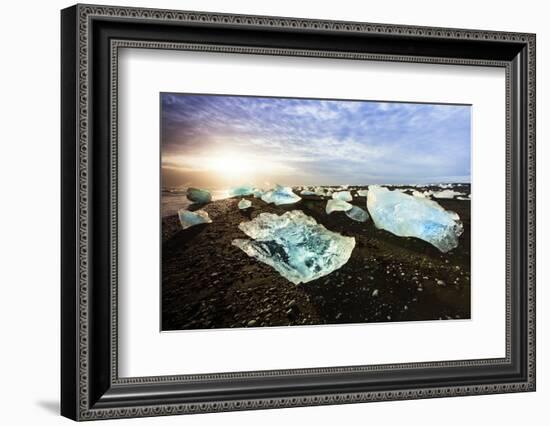 Icebergs on a black sand volcanic beach next to the Jokulsarlon glacial lake in Vatnajokull Nationa-Alex Robinson-Framed Photographic Print