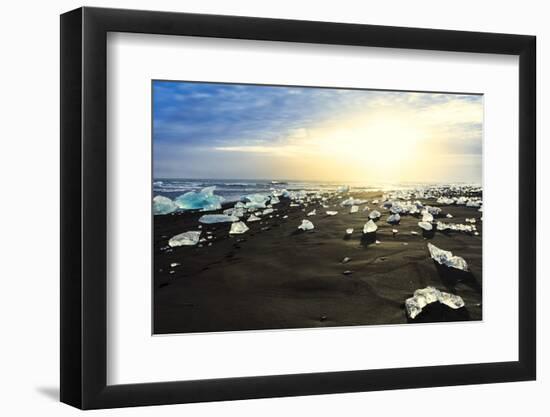 Icebergs on a black sand volcanic beach next to the Jokulsarlon glacial lake in Vatnajokull Nationa-Alex Robinson-Framed Photographic Print