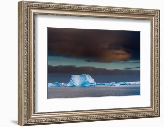 Icebergs under a stormy sky, Lemaire channel, Antarctica.-Sergio Pitamitz-Framed Photographic Print