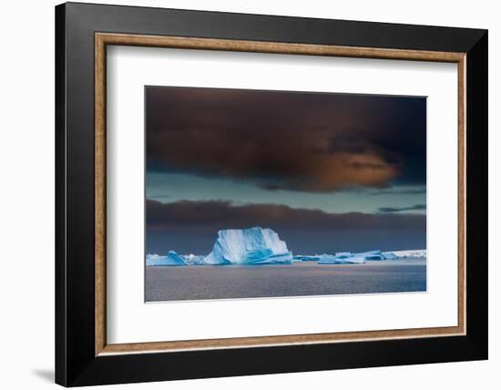 Icebergs under a stormy sky, Lemaire channel, Antarctica.-Sergio Pitamitz-Framed Photographic Print