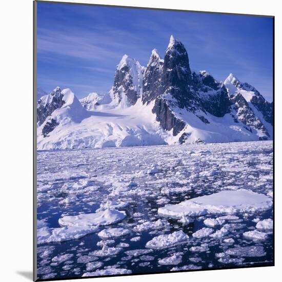 Iceflow off the Rugged West Coast of the Antartic Peninsula, Antarctica-Geoff Renner-Mounted Photographic Print