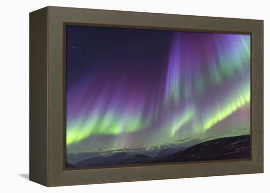 Iceland, Akureyri. The northern lights glow in unbelievable colors.-Ellen Goff-Framed Premier Image Canvas