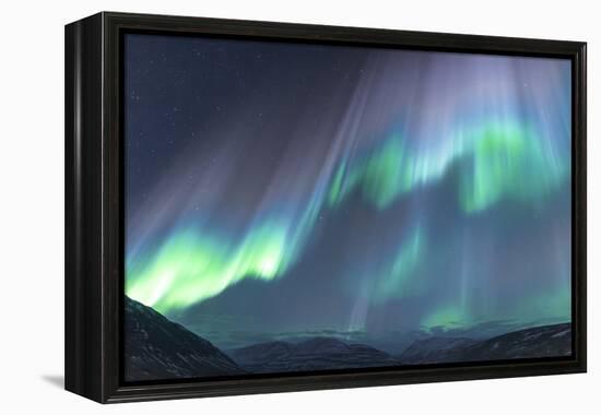 Iceland, Akureyri. The northern lights glow in unbelievable colors.-Ellen Goff-Framed Premier Image Canvas