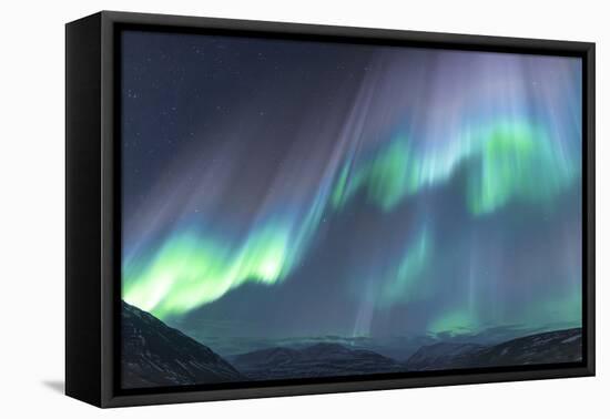 Iceland, Akureyri. The northern lights glow in unbelievable colors.-Ellen Goff-Framed Premier Image Canvas