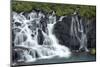 Iceland, Hraunfossar. Tiny cascades emerge from the lava to flow into the Hvita River-Ellen Goff-Mounted Photographic Print