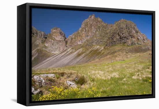 Iceland, Mountain peaks rise high above the coast.-Ellen Goff-Framed Premier Image Canvas