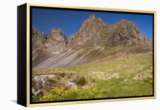 Iceland, Mountain peaks rise high above the coast.-Ellen Goff-Framed Premier Image Canvas