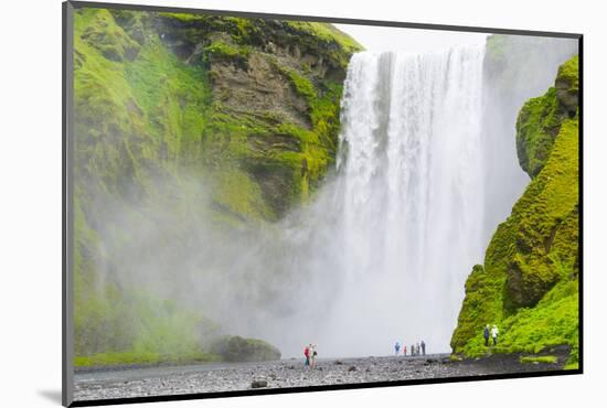 Iceland. South. Skogafoss. Hikers are Skogafoss Waterfall-Inger Hogstrom-Mounted Photographic Print