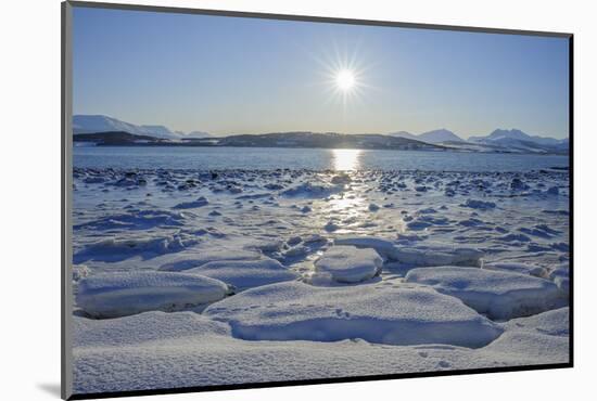 Icy and snowy coastal landscape with sun in winter, Nordbotn, Tromso, Troms, Norway-Raimund Linke-Mounted Photographic Print