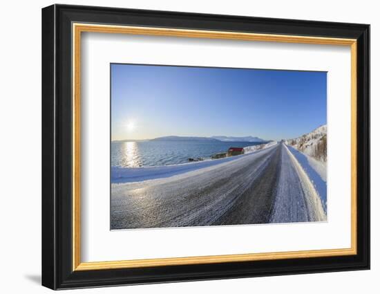 Icy coastal road with sun in winter, Buvik, Kvaloy, Troms, Norway-Raimund Linke-Framed Photographic Print