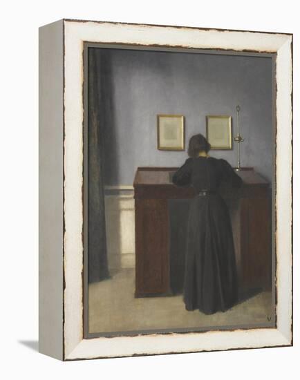 Ida Standing at a Desk-Vilhelm Hammershoi-Framed Premier Image Canvas