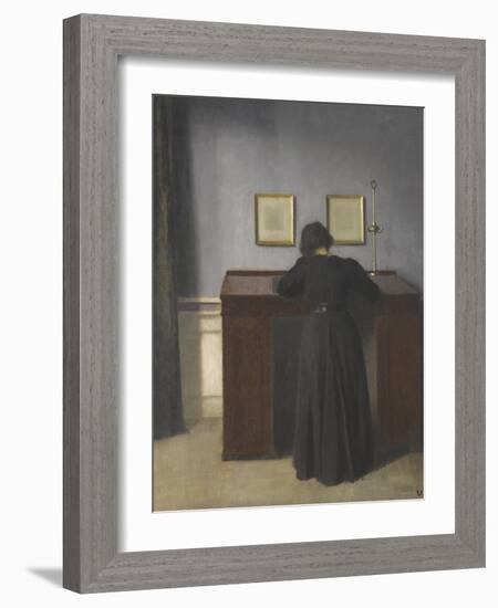 Ida Standing at a Desk-Vilhelm Hammershoi-Framed Giclee Print