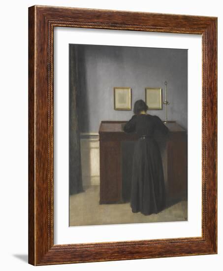 Ida Standing at a Desk-Vilhelm Hammershoi-Framed Giclee Print