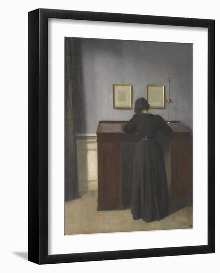 Ida Standing at a Desk-Vilhelm Hammershoi-Framed Giclee Print