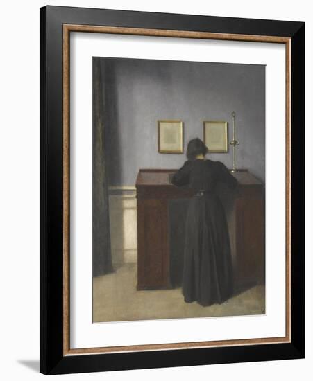Ida Standing at a Desk-Vilhelm Hammershoi-Framed Giclee Print