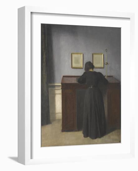 Ida Standing at a Desk-Vilhelm Hammershoi-Framed Giclee Print