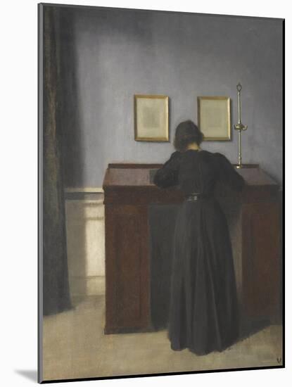 Ida Standing at a Desk-Vilhelm Hammershoi-Mounted Giclee Print