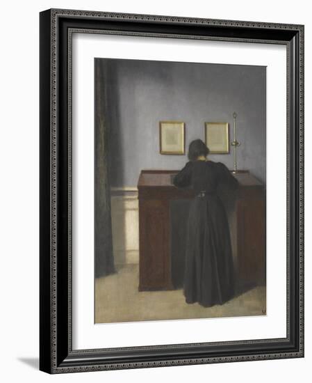 Ida Standing at a Desk-Vilhelm Hammershoi-Framed Giclee Print