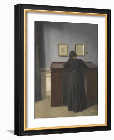 Ida Standing at a Desk-Vilhelm Hammershoi-Framed Giclee Print