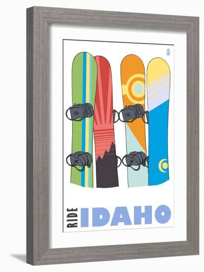 Idaho, Snowboards in the Snow-Lantern Press-Framed Premium Giclee Print