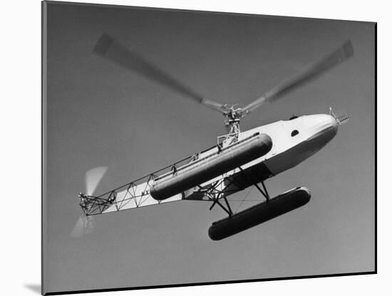 Igor Sikorsky Making Helicopter Flight-Dmitri Kessel-Mounted Photographic Print