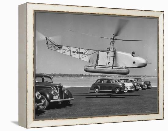 Igor Sikorsky Taking Off in Helicopter from Parking Lot-Dmitri Kessel-Framed Premier Image Canvas