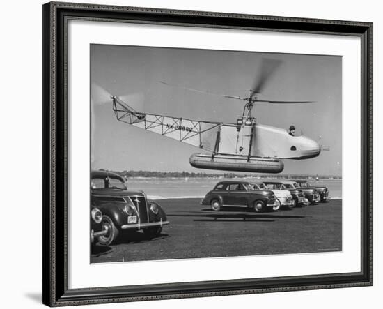 Igor Sikorsky Taking Off in Helicopter from Parking Lot-Dmitri Kessel-Framed Premium Photographic Print