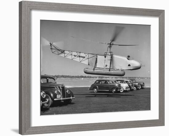 Igor Sikorsky Taking Off in Helicopter from Parking Lot-Dmitri Kessel-Framed Premium Photographic Print