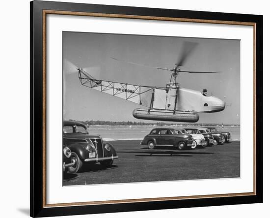 Igor Sikorsky Taking Off in Helicopter from Parking Lot-Dmitri Kessel-Framed Premium Photographic Print